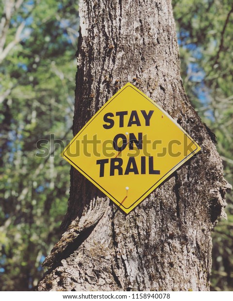 Yellow Stay On Trail Sign On Stock Photo (Edit Now) 1158940078