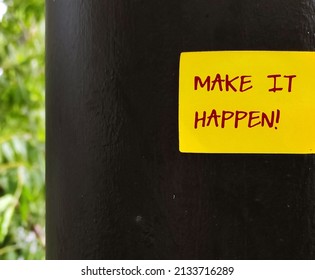 Yellow stick note on black wall with handwritten text MAKE IT HAPPEN!, idiom of self motivati on to make efforts and achieve your goal, take action, do it and complete it - Shutterstock ID 2133716289