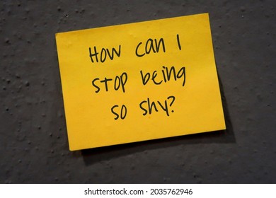 Yellow Stick Note On Gray Wall With Handwritten-How Can I Stop Being So Shy?-concept Of People Struggling With Shyness, Overcome Low Self-esteem,fear Of Judgment Or Rejection, To Improve Social Skill