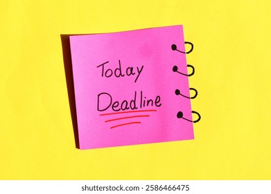 Yellow sticky note on date calendar with text written DEADLINE TODAY! concept of self warning to get job done ontime in very tight deadline to meet customers expectation