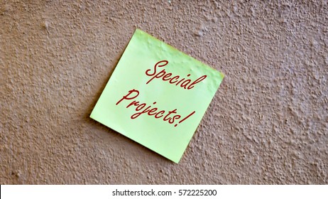 Yellow Sticky Note At On Wall Background With The Word Special Projects