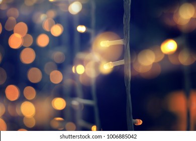 Yellow String Lights With Bokeh Decor In Outdoor Restaurant