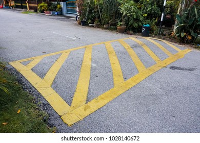 Yellow Stripes Speed Bump On Road Stock Photo 1028140672 | Shutterstock