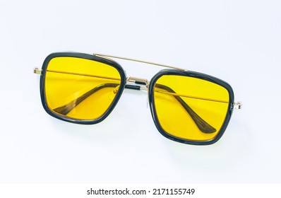 yellow sunglasses white background Anti  glare glasses for the driver in metal frame and yellow glasses white background 