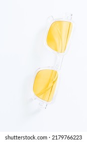 Yellow sunglasses white background Anti  glare glasses for the driver in metal frame and yellow glasses white background  