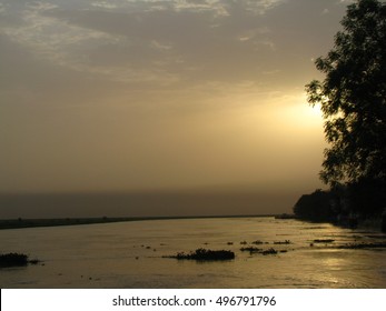 Yellow Sunset Above White Nile River, Beautiful African Nature Background.