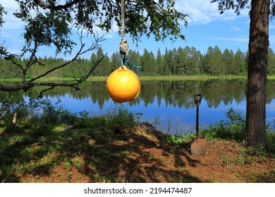 Yellow Swing In Nature. Forest And Trees. Summer Time. Jämtland, Sweden, Scandinavia, Europe.