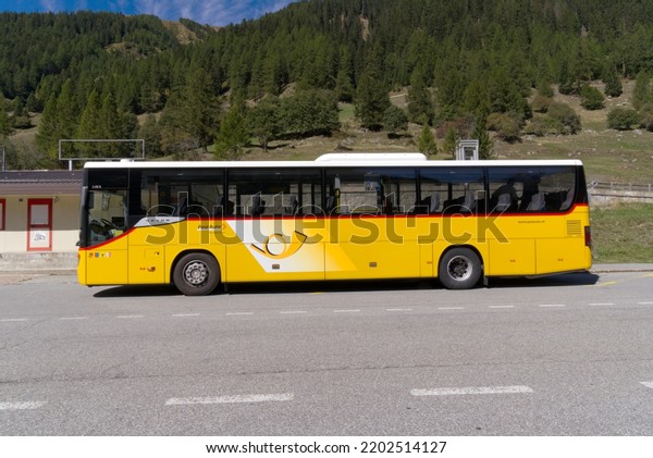 Yellow Swiss\
Post bus line 161 at bus station of mountain village Oberwald,\
Canton Valais, on a late summer sunny noon. Photo taken September\
12th, 2022, Oberwald,\
Switzerland.