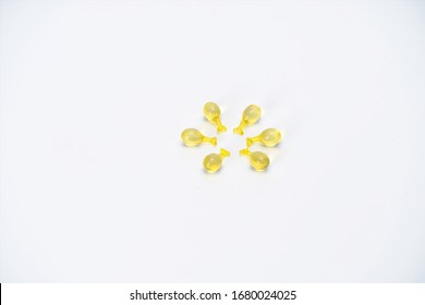 Yellow Tadpole Shaped Pill. This Is The Development Trend Of Pediatric Medical Industry In The Future. Lovely Shaped Capsules Can Make Children Not Afraid To Take Medicine.