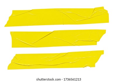 Yellow tape stickers isolated. Adhesive grunge ripped tape pieces set on white background