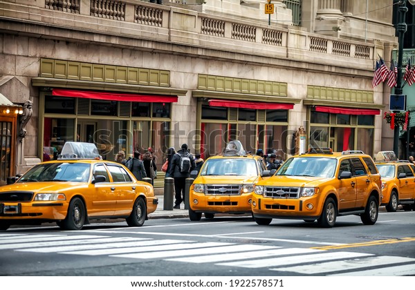 Yellow Taxi in\
Manhattan, New York City  in USA\
