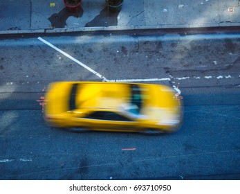 Yellow Taxi In Motion Blur. View From Above. New York City