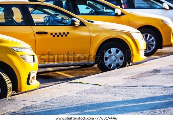 yellow taxi in the parking\
lot