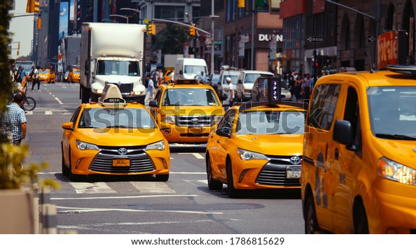 Yellow taxis\
on the road in New York City, USA\
2019