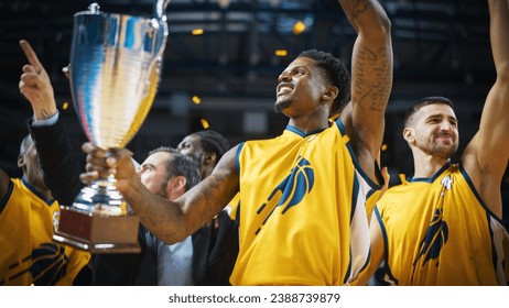 Yellow Team Basketballers Celebrating Successful Victory Over a National Basketball Club, Cheering Together with Teammates and Coaches. Beautiful Cinematic Shot with Happy Athletes And Confetti. - Powered by Shutterstock