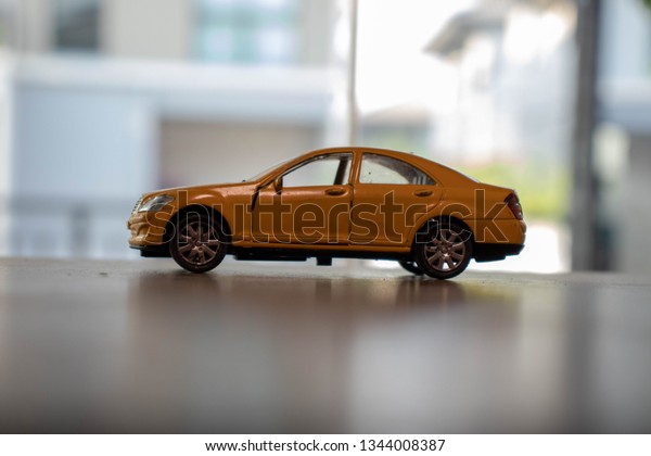 Yellow toy car background
