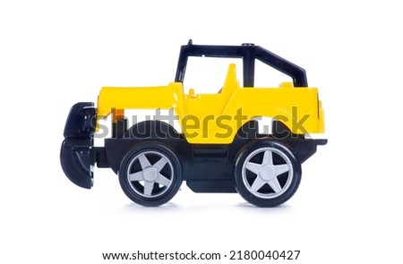 Yellow toy car on white background isolation