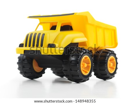 Yellow toy dump truck isolated on white background