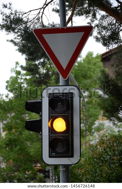 a yellow traffic\
light in Bavaria, Germany