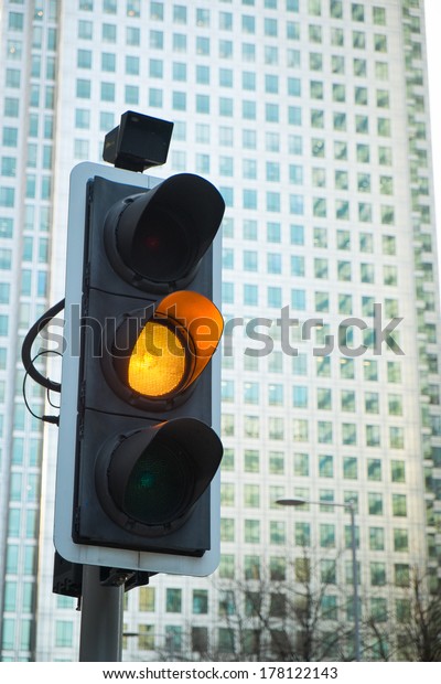 Yellow Traffic Light in the\
city