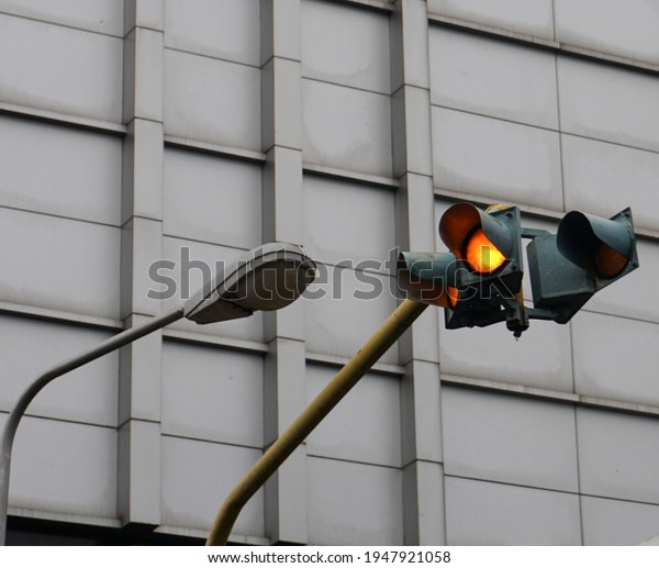 Yellow traffic light on the\
street