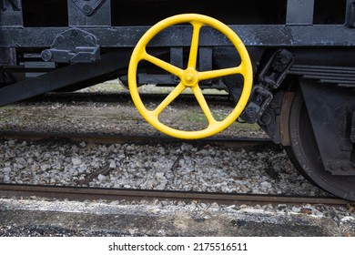 Yellow train iron handler. Old steam train in Martel, Dordogne, France