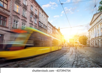 Yellow Tram Rides On The Morning  Old European City