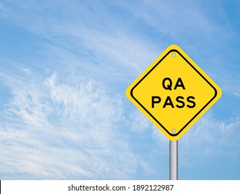 Yellow Transportation Sign With Word QA (Quality Assurance) On Blue Sky Background