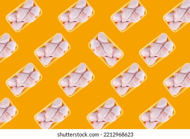 Yellow Trays With Raw Chicken Drumstick On Yellow Background, Pattern