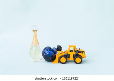 Yellow truck moving perfume bottle, clearnance sale concept