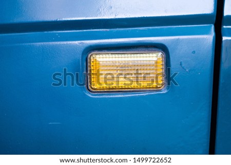 yellow turn indicator on a car
