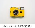 Yellow vintage film camera object