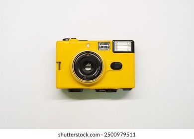 Yellow vintage film camera object