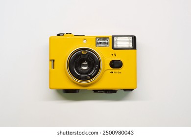 Yellow vintage film camera object