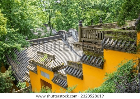 The yellow wall of Lingyin temple.  A Buddhist temple of the Chan sect located north-west of Hangzhou.
One of the largest and wealthiest Buddhist temples in China.