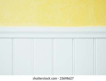 Yellow Wall Treatment With White  Wainscoting