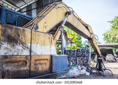 Yellow Waste trucks In the garbage yard - Powered by Shutterstock