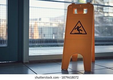 Yellow Wet Floor Warning Sign