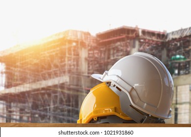 Yellow And White Helmet Safety In Construction Site