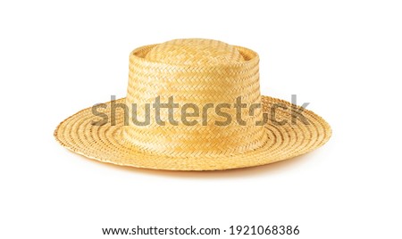 Yellow wide brim straw hat isolated on white background. Summer female vintage classic headwear. Stylish modern eco-friendly accessory for beach, vacation and travel. Front view. 