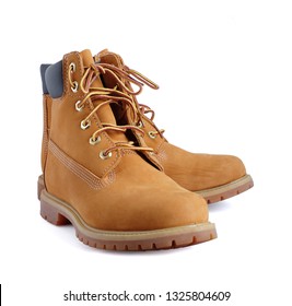 yellow winter women's boot shoes on white background.This has clipping path. - Shutterstock ID 1325804609