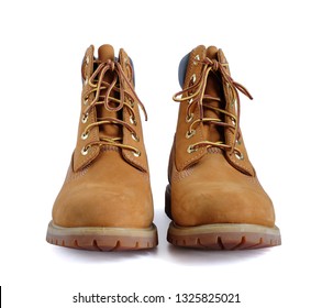 yellow winter women's boot shoes on white background.This has clipping path. - Shutterstock ID 1325825021
