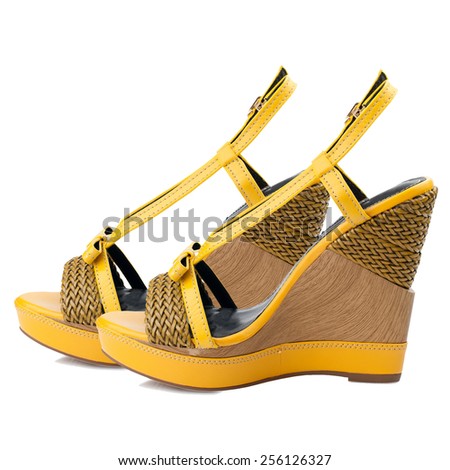 Yellow women shoes isolated on white background.