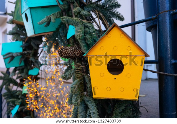 Yellow Wooden Colorful Bird Feeders On Parks Outdoor Objects