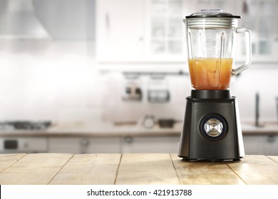 Yellow Wooden Kitchen Table And Blender And Juice 