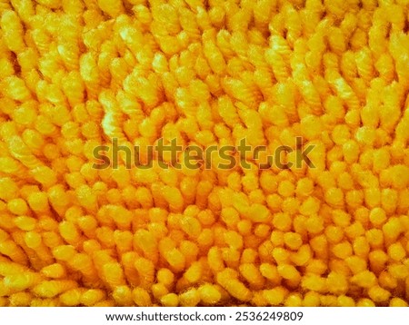 Yellow wool from latch hook craft 