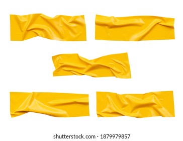 Yellow wrinkled adhesive tape isolated on white background. Yellow tape of different sizes. - Shutterstock ID 1879979857