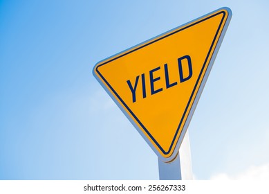 A yellow yield to surfer sign in southern California