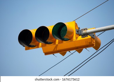 Yellow-colored Traffic Light In The School Zone.