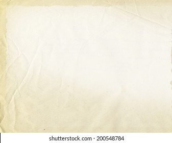 Yellowed Sheet Of Paper, Faded Background.